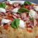 Focaccia con Piennolo Dop, mozzarella di bufala, basilico, filetto di tonno e cipolla rossa